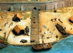 Rekonstruktion des Lübecker Hafens mit Stadtmauer um 1180: Die Stadtmauer ist schon massiv aus Backstein, jedoch noch ohne Türme